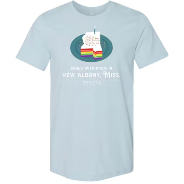 Blue Shirt with Rainbow Cake Graphic and Baked with Pride in New Albany Mississippi text