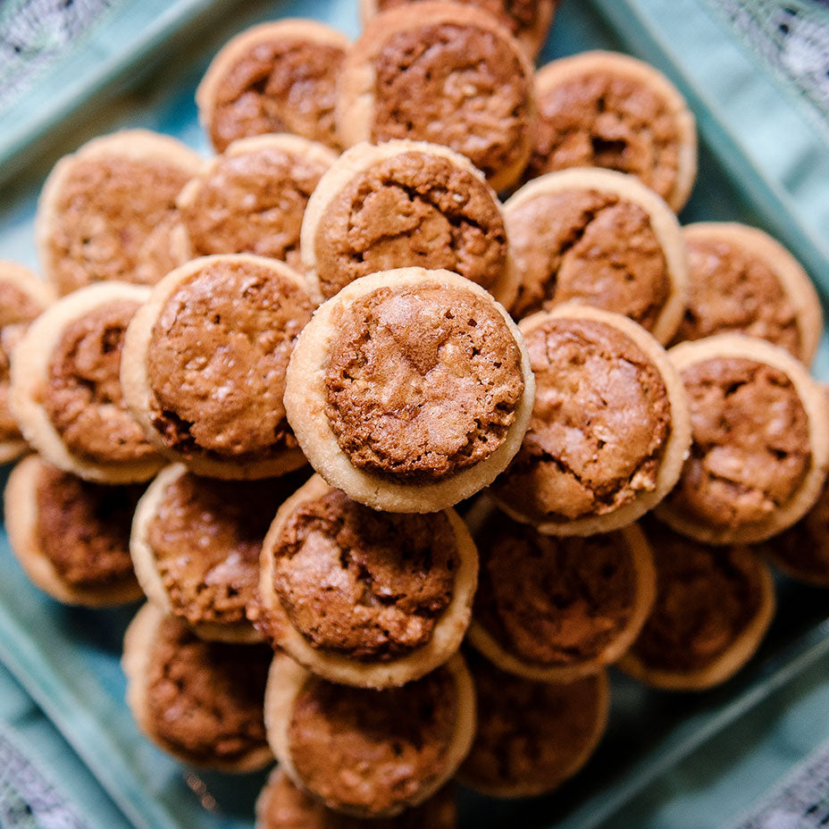 a pyramid of pecan tassie, shot from the top
