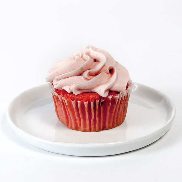 Strawberry cupcake on a white plate