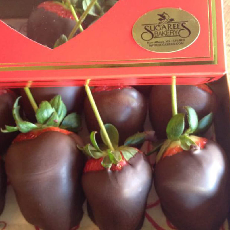 Chocolate covered strawberries in a Sugaree's bakery package