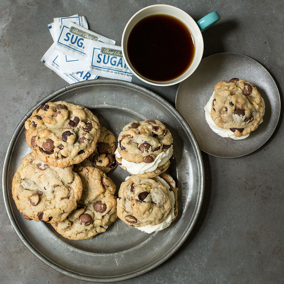 Seven plated Double Doozies with a cup of coffee on a concrete countertop