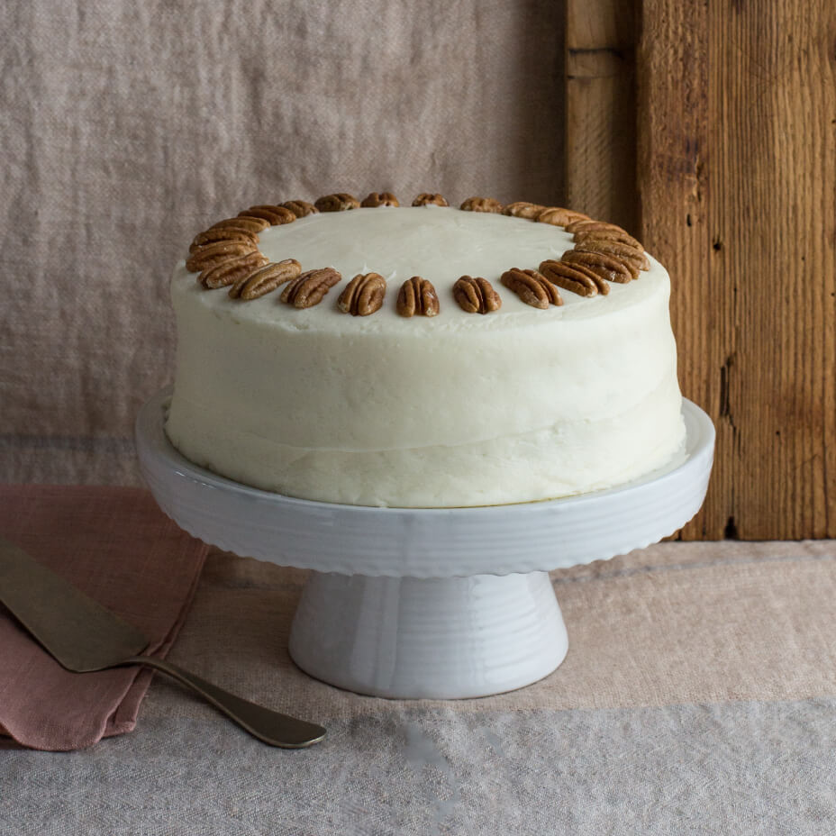Italian cream cake on white tray