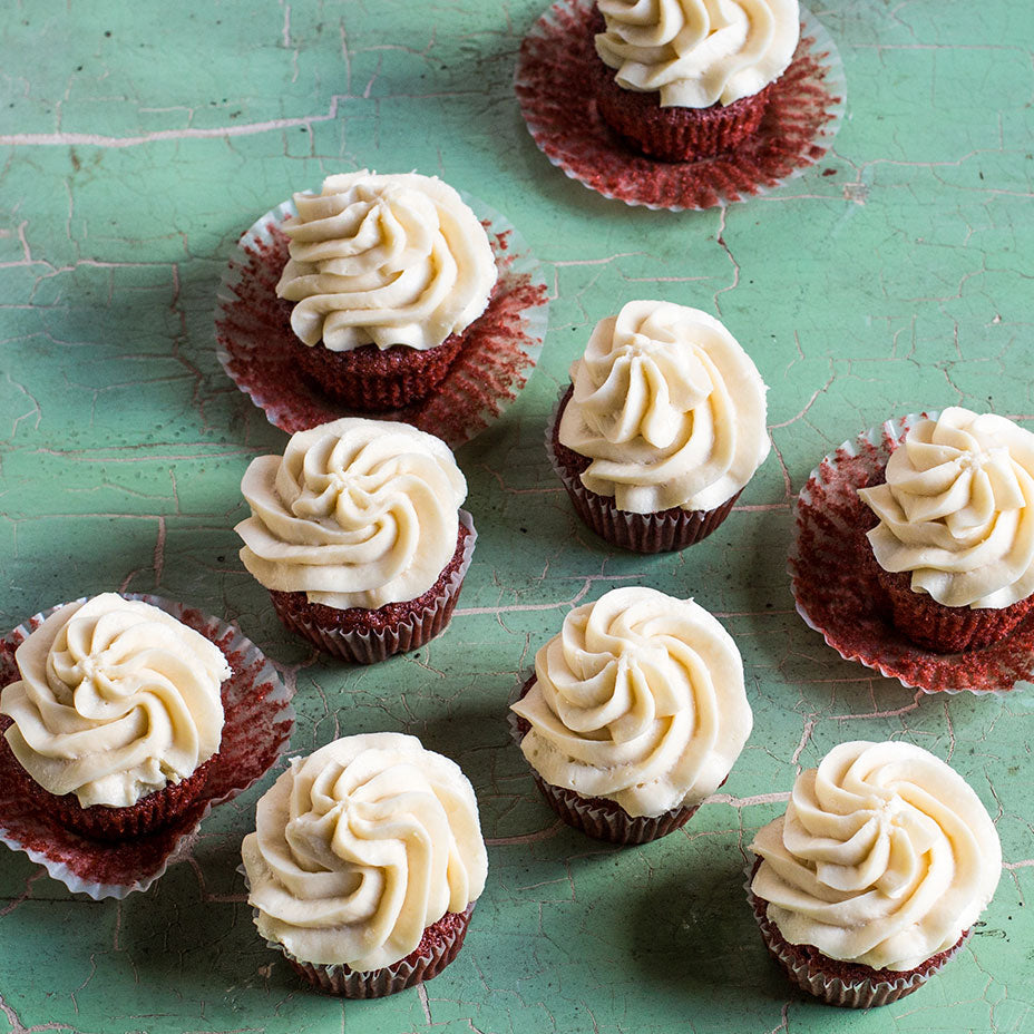 Red Velvet cupcakes on a green countertop